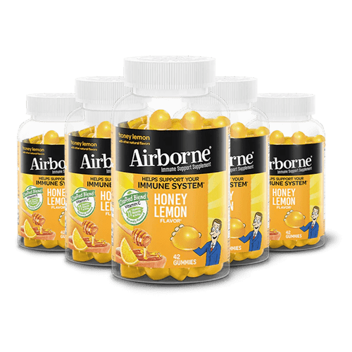 Five bottles of Airborne Honey Lemon capsules
